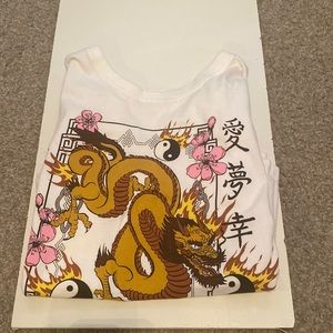 It’s a golden dragon and pink flowers